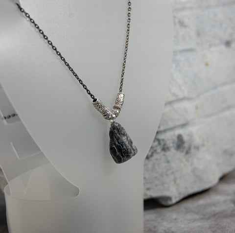 Black Chain Necklace with Eye-Catching Stone