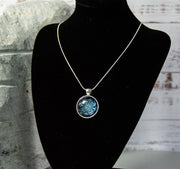 Eye-catching Blue on White kaleidoscopic patterned Cabochon on silver-finish snake chain