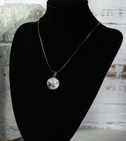 Glittering and glistening clear crystals in black-finish necklace