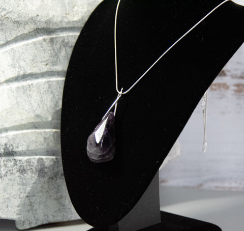 Amethyst! An incredible large piece of this all-Canadian rock, on silver-finish chain