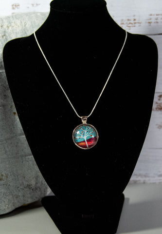 Tree of Life Cabochon with entrancing pastel reds and blues, on silver-finish necklace