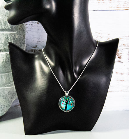 Tree of Life Cabochon with entrancing pastel greens and blues, on silver-finish mount and snake chain