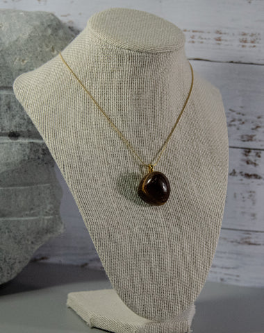 Finished and shaped Tiger Eye stone necklace, dark brown with multitude of cream accents