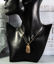 Unfinished Tiger Eye rock, dark brown with multitude of cream accents, on gold-finish snake chain