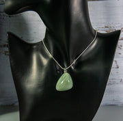 Finished and shaped light green Fluorite necklace, with subtle green and white accents